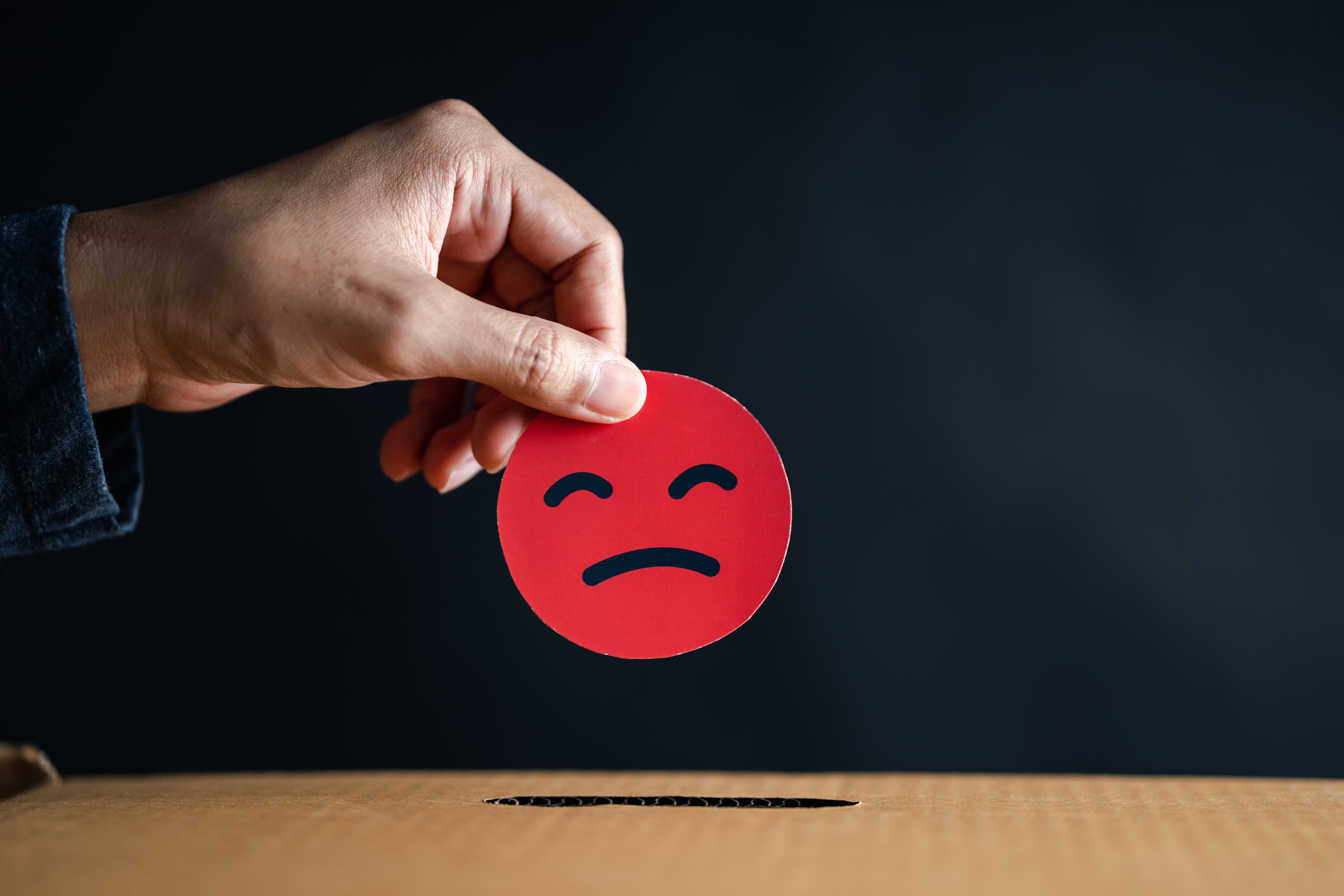 Negative feedback symbolizing poor reviews and lack of references — clear red flags you hired the wrong custom home builder.